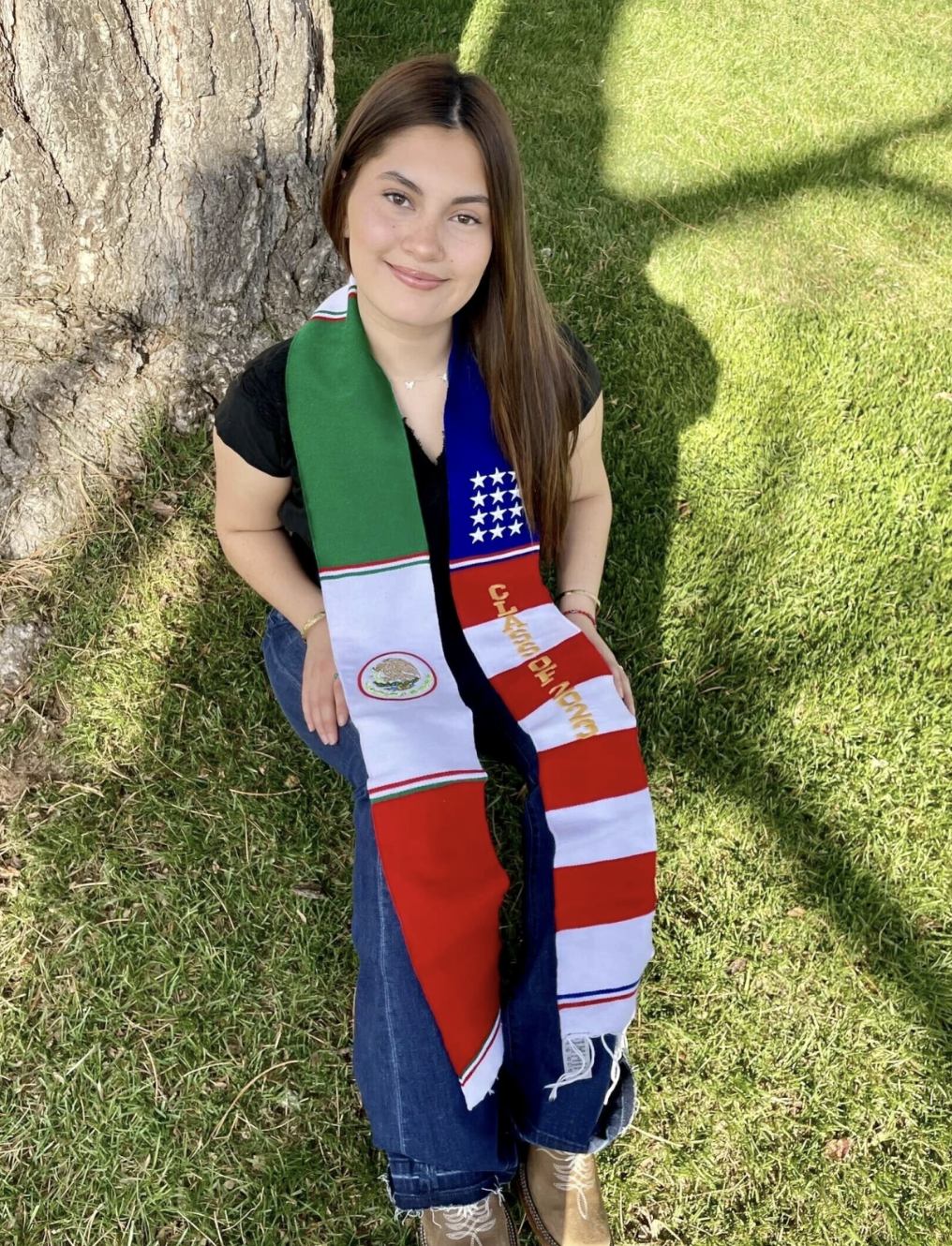 Naomi Peña Villasano initiated legal action against her school district for preventing her from wearing a sash adorned with American and Mexican flags at her graduation ceremony. Credit: AP
